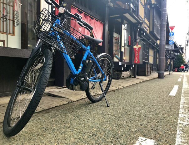 A blue electric bike at the traditional street in Takayama